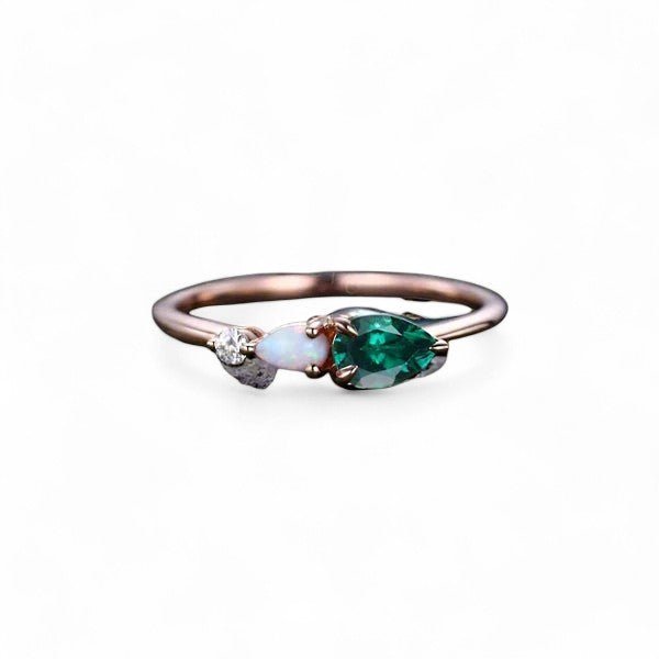 0.3 CT Pear cut Emerald Three Stone Ring - GEMPARA