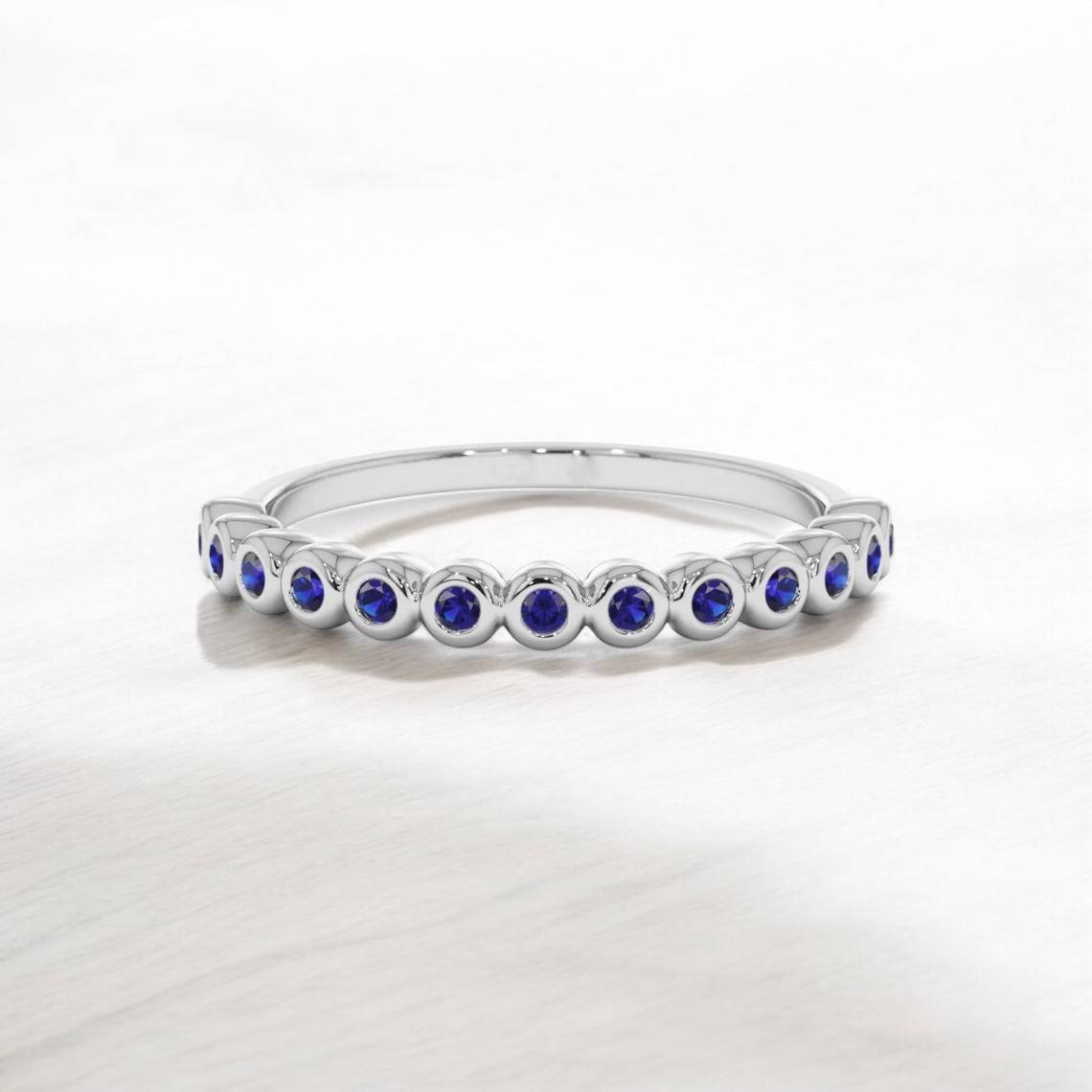 Round Lab Blue Sapphire Bezel Half Eternity Ring - GEMPARA