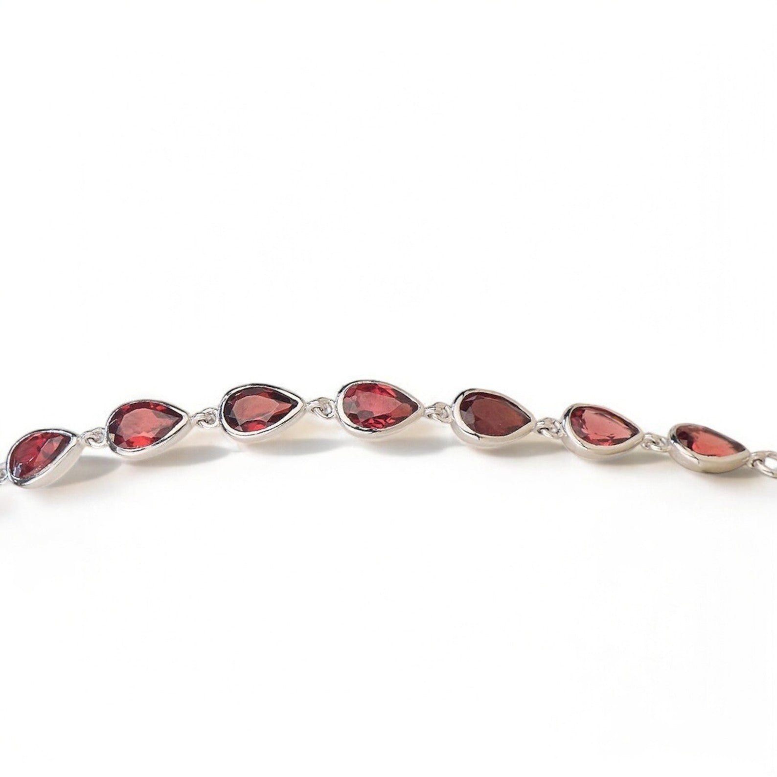 Silver Pear-Cut Garnet Tennis Bracelet - GEMPARA